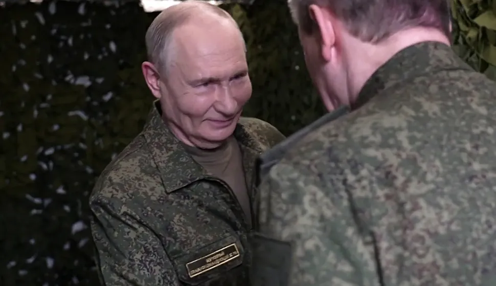 In this grab taken from a handout footage posted of the official website of the Russian presidential press office on July 3, 2026, Russia's President Vladimir Putin is welcomed by Chief of the General Staff Valery Gerasimov as he visits a command post for the joint force grouping, amid the ongoing Russian-Ukrainian conflict. (Photo by Handout/RUSSIAN PRESIDENTIAL PRESS OFFICE/AFP)/RESTRICTED TO EDITORIAL USE - MANDATORY CREDIT "AFP PHOTO/Russian presidential press office" - HANDOUT - NO MARKETING NO ADVERTISING CAMPAIGNS - DISTRIBUTED AS A SERVICE TO CLIENTS