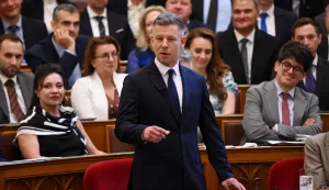 Hungarian Prime Minister Peter Magyar (C) answers questions from the opposition after members of parliament voted for new legislation in the main hall of the Parliament on June 23, 2026, during an extraordinary session of the National Assembly. Hungarian lawmakers on June 23 approved anti-corruption measures, part of new Prime Minister Peter Magyar's sweeping reform drive and aimed at helping the country get billions of euros in withheld European Union funds. The EU announced late last month it would unlock more than 16 billion euros (USD 18 billion) for Hungary that had been frozen over rule-of-law concerns during nationalist Viktor Orban's rule, if Budapest stays on track with a major reform push. (Photo by Attila KISBENEDEK/AFP)