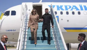 Ukraine's President Volodymyr Zelensky arrives with his wife Olena Zelenska (R) at Esenboga Airport to attend the 36th NATO Heads of State and Government Summit in Ankara on July 7, 2026. (Photo by Metin Akta?/POOL/AFP)