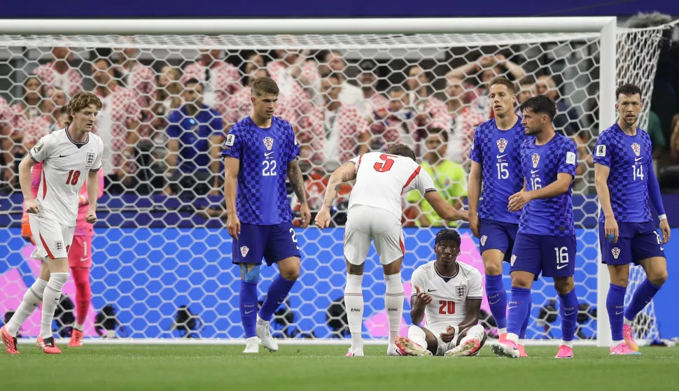 Dallas, 17.06.2026 - Utakmica 1. kola L skupine Svjetskoga nogometnoga prvenstva Engleska - Hrvatska. Na slici Luka Vu&scaron;ković, Mario Pa&scaron;alić, Ivan Peri&scaron;ić, Martin Baturina, Noni Madueke, John Stones, Anthony Gordon.foto HINA/ Daniel KASAP/ ds