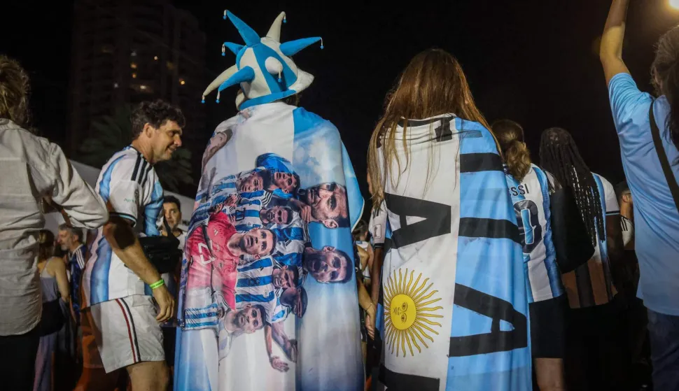 Argentina fans celebrate their team's victory in the World Cup quarterfinal match against Switzerland in Miami Beach, Florida, on July 11, 2026. (Photo by Giorgio Viera/AFP)