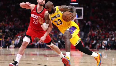 HOUSTON, TEXAS - MAY 01: LeBron James #23 of the Los Angeles Lakers drives to the basket against Alperen Sengun #28 of the Houston Rockets during the fourth quarter in Game Six of the First Round of the NBA Western Conference Playoffs at Toyota Center on May 01, 2026 in Houston, Texas. NOTE TO USER: User expressly acknowledges and agrees that, by downloading and or using this photograph, User is consenting to the terms and conditions of the Getty Images License Agreement. Kenneth Richmond/Getty Images/AFP (Photo by Kenneth Richmond/GETTY IMAGES NORTH AMERICA/Getty Images via AFP)