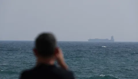 epa12192587 A container ship sails on the Strait of Hormuz, as seen from Ras Al Khaimah, United Arab Emirates, 23 June 2025. The Strait lies between Oman and Iran and links the Gulf to the Arabian Sea. The Iranian parliament approved a measure to close the Strait of Hormuz, following US strikes on three of Iran's key nuclear sites on 22 June 2025. Israel and Iran have been exchanging fire since Israel launched strikes across Iran on 13 June 2025. EPA/ALI HAIDER