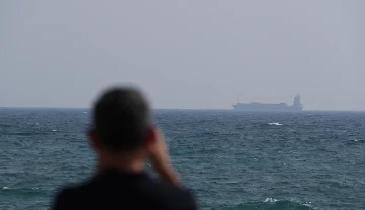 epa12192587 A container ship sails on the Strait of Hormuz, as seen from Ras Al Khaimah, United Arab Emirates, 23 June 2025. The Strait lies between Oman and Iran and links the Gulf to the Arabian Sea. The Iranian parliament approved a measure to close the Strait of Hormuz, following US strikes on three of Iran's key nuclear sites on 22 June 2025. Israel and Iran have been exchanging fire since Israel launched strikes across Iran on 13 June 2025. EPA/ALI HAIDER