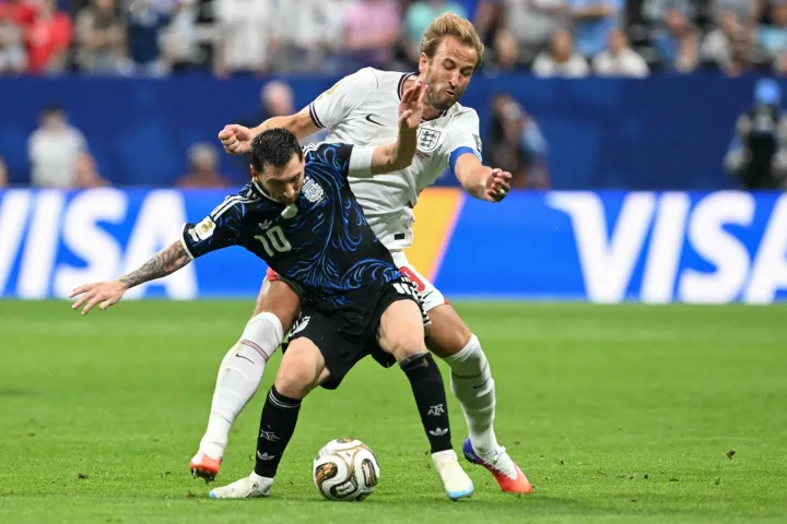 TOPSHOT - England's forward #09 Harry Kane and Argentina's forward #10 Lionel Messi fight for the ball during the 2026 World Cup football tournament semi-final match between England and Argentina at the Atlanta Stadium in Atlanta on July 15, 2026. (Photo by ROBERTO SCHMIDT/AFP)