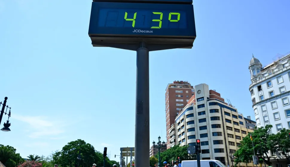 An urban thermometer reading 43 degrees Celsius is seen during a hewatwave in Valencia on July 7, 2026. Spain's AEMET weather agency on Tuesday declared a top level red heat alert in three eastern regions and predicted that temperatures would rise above 40C. The Aragon, Catalonia and Valencia regions are predicted to be among the worst hit in a new heatwave that is hitting southern Europe this week. Forecasters have said it will last until at least Thursday. (Photo by Jose Jordan/AFP)