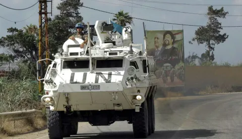 Members of United Nations Peacekeeping Force in Lebanon (UNIFIL) drive through the southern Lebanese area of Al-Mansouri on July 2, 2026. Lebanese President Joseph Aoun defended on July 2 negotiations with Israel, saying they were not a betrayal and he would not surrender "a single inch of Lebanon's territory", according to the presidency. (Photo by Kawnat HAJU/AFP)
