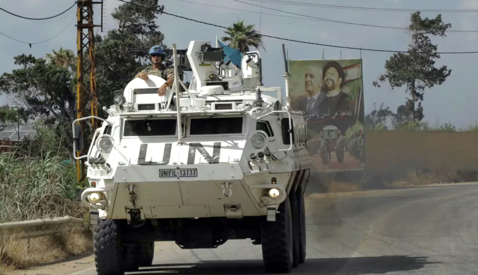 Members of United Nations Peacekeeping Force in Lebanon (UNIFIL) drive through the southern Lebanese area of Al-Mansouri on July 2, 2026. Lebanese President Joseph Aoun defended on July 2 negotiations with Israel, saying they were not a betrayal and he would not surrender "a single inch of Lebanon's territory", according to the presidency. (Photo by Kawnat HAJU/AFP)