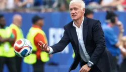 France's head coach Didier Deschamps throws the ball during the 2026 World Cup football tournament quarter-final match between France and Morocco at Boston Stadium in Foxborough on July 9, 2026. (Photo by FRANCK FIFE/AFP)