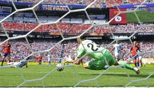 Argentina's goalkeeper #23 Emiliano Martinez stops the ball during the 2026 World Cup football tournament final match between Spain and Argentina at the New York/New Jersey Stadium in East Rutherford on July 19, 2026. (Photo by JUAN MABROMATA/AFP)