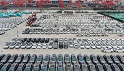 (FILES) Electric vehicles for export are seen at a port in Hangzhou, in eastern China's Zhejiang province on April 2, 2025. Canada will allow 49,000 Chinese electric vehicles to be imported under new, preferential tariff rates, Prime Minister Mark Carney said on January 16, 2026 after reaching a trade deal with China's leader Xi Jinping in Beijing. (Photo by AFP)/China OUT