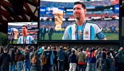 Supporters watch Argentina's Lionel Messi reacting on giant screens in Sydney on July 20, 2026 after Spain defeated Argentina in the 2026 World Cup football final. (Photo by DAVID GRAY/AFP)/-- IMAGE RESTRICTED TO EDITORIAL USE - STRICTLY NO COMMERCIAL USE --