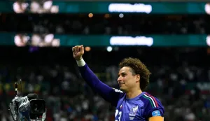 Mexico's goalkeeper #13 Guillermo Ochoa celebrates after winning the 2026 World Cup Group A football match between the Czech Republic and Mexico at the Mexico City Stadium in Mexico City on June 24, 2026. (Photo by Alfredo ESTRELLA/AFP)