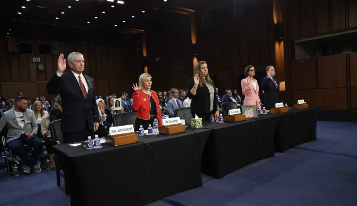 WASHINGTON, DC - JULY 16: (L-R) Former Attorney General John Ashcroft, Dani Bensky, Epstein Survivor, Jennifer Bos, the mother of Megan Bos, Elizabeth Oyer, Former Department of Justice Pardon Attorney, and Jon Adler, President Federal Law Enforcement Officers Association Foundation, are sworn in before speaking on Capitol Hill during the confirmation hearing for Todd Blanche as the U.S. Attorney General on July 16, 2026 in Washington, DC. During Blanche's tenure as acting Attorney General the Justice Department has been under scrutiny for pushing President Trump's 1.8 billion dollar "anti-weaponization" fund and its handling of the Epstein files. Win McNamee/Getty Images/AFP (Photo by WIN MCNAMEE/GETTY IMAGES NORTH AMERICA/Getty Images via AFP)