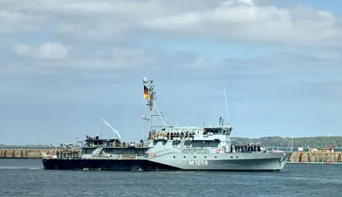 (FILES) The German navy's minehunter boat "Fulda" leaves the harbour of Kiel, northern Germany, on May 4, 2026, to set sail for the Mediterranean as part of a pre-deployment operation in preparation for a possible mission in the Strait of Hormuz. The German navy will move two vessels from the Red Sea region to the eastern Mediterannean "in the coming days", the defence ministry said in a statement on July 23, 2026. The "Fulda" minesweeper and the "Mosel" supply ship were currently in Djibouti, a ministry spokesman confirmed to AFP. They had been sent last month in preparation for a possible mission in the Strait of Hormuz after the end of the US-Iran war. However the ministry statement cited the "the volatile political situation... and the absence of any foreseeable near-term start of operations" in the Strait of Hormuz. (Photo by Sandra BECKEFELDT/AFP)