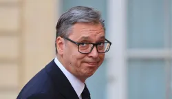 Serbia's President Aleksandar Vucic arrives for a dinner of the Coalition of the Willing to support Ukraine at The Elysee Presidential Palace in Paris on July 13, 2026. Macron is convening a summit in Paris of the Coalition of the Willing to support Ukraine - launched by France and the United Kingdom to provide military support to Ukraine after Russia's full-scale invasion - that will be attended by Ukraine's President, signaling the "strategic awakening" he seeks for Europe in the face of Russia and United States. (Photo by Ludovic MARIN/AFP)