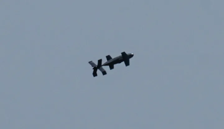 A MEROPS drone is pictured during Exercise EASTERN PHOENIX 26, a training activity designed to test counter-unmanned aircraft systems (C-UAS) procedures, at Capu Midia firing range, April 24, 2026. MEROPS is a U.S.-made, AI-powered counter-drone system designed to intercept loitering munitions and attack drones (like Shahed-136s) using low-cost, AI-guided "Surveyor" drones. The exercise, which includes NATO?s first "Crucible Series" event, aims to strengthen national defense and NATO?s Eastern Flank by integrating kinetic and non-kinetic responses to airspace incursions with special interest in the testing of anti-drones measures. Participants included aproximately 250 Romanian military personnel and 250 industry representatives from 21 NATO allied nations. (Photo by Daniel MIHAILESCU/AFP)