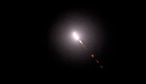 This photograph shows a flying missile during Russian missile strikes on the Ukrainian capital of Kyiv on July 19, 2026, amid the Russian invasion in Ukraine. Russian missiles rocked Ukraine's capital overnight, killing at least one person and wounding five others day after Kyiv launched a deadly wave of drones that pounded e-commerce warehouses in Russia. (Photo by Sergei SUPINSKY/AFP)