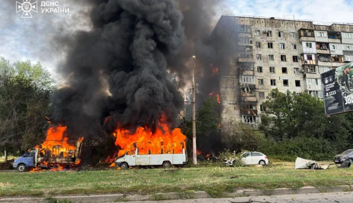 This handout photograph taken and released by the State Emergency Service of Ukraine on July 21, 2026 shows a fire at the site of an air strike in the town of Zaporizhzhia, amid the Russian invasion of Ukraine. During the day, Russian forces launched guided glide bombs at central Zaporizhzhia. Two local residents were killed and nine others were injured according to Zaporizhzhia military administration. One glide bomb landed near a printing house, setting parked cars on fire. Another bomb struck near a nine-storey apartment building, sparking a fire that engulfed the building. (Photo by Handout/STATE EMERGENSY SERVICE OF UKRAINE/AFP)/RESTRICTED TO EDITORIAL USE - MANDATORY CREDIT "AFP PHOTO/STATE EMERGENCY SERVICE OF UKRAINE" - HANDOUT - NO MARKETING NO ADVERTISING CAMPAIGNS - DISTRIBUTED AS A SERVICE TO CLIENTS