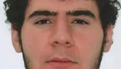 This undated handout image released by Polizei Berlin on July 26, 2026 shows a 21-year old suspect identified by police as Abdul B. in a public appeal for his arrest, after a car ploughed into a crowd near Berlin's Gay Pride celebrations killing one person and wounding 16 others. Berlin police described the suspect as slender, about 1.90 metres (6 feet 3 inches) tall, with black hair, wearing a black hoodie and white trousers. (Photo by Handout/POLIZEI BERLIN/AFP)/RESTRICTED TO EDITORIAL USE - MANDATORY CREDIT "AFP PHOTO/POLIZEI BERLIN" - HANDOUT - NO MARKETING NO ADVERTISING CAMPAIGNS - DISTRIBUTED AS A SERVICE TO CLIENTS