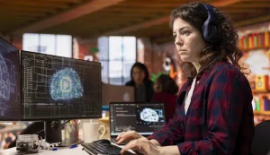 IT engineer wearing headphones works in AI tech agency providing custom software development services. IT expert listening music, using artificial intelligence technology to streamline coding process