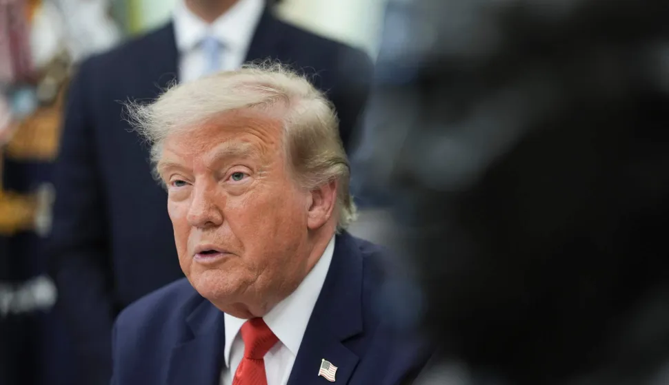 US President Donald Trump speaks in the Oval Office of the White House in Washington, DC, on July 29, 2026. US President Donald Trump unveiled a $20 billion plan to rebuild and renovate Washington Dulles International Airport. (Photo by Ken Cedeno/AFP)