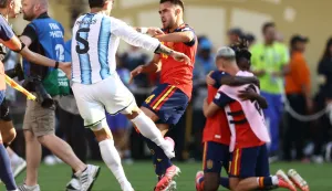 Argentina's midfielder #05 Leandro Paredes (L) clashes with Spain's defender #04 Eric Garcia at the end of the 2026 World Cup football tournament final match between Spain and Argentina at the New York/New Jersey Stadium in East Rutherford on July 19, 2026. (Photo by CHARLY TRIBALLEAU/AFP)