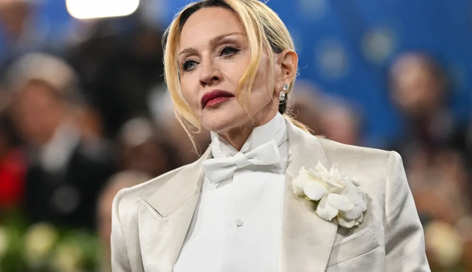 (FILES) US singer songwriter Madonna arrives for the 2025 Met Gala at the Metropolitan Museum of Art on May 5, 2025, in New York. Madonna released her fifteenth album on July 3, 2026, "Confessions II", with many critics calling the 16 tracks of feel-good club vibes and classic dance music sounds her best release in decades. The Queen of Pop, 67, has reunited with British producer Stuart Price, whom she worked with for "Confessions on a Dance Floor" in 2005 which was a global success driven by the hits "Sorry" and "Hung Up". (Photo by Angela WEISS/AFP)