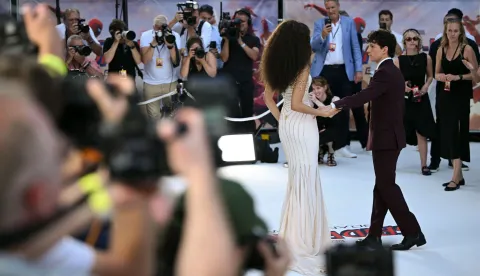 US actor Zendaya and US actor Tom Holland pose for selected media on the red carpet upon arrival to attend the UK Premiere for 'Spider-Man: Brand New Day UK' at the Odeon Luxe Leicester Square in central London on July 29, 2026. (Photo by JUSTIN TALLIS/AFP)