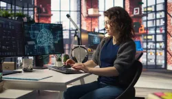 Teleworking developer using computer for artificial intelligence computing through self learning algorithms. Agency IT engineer works with AI deep neural networks on desktop PC. Camera A.umjetna inteligencija, AI, računalo, tehnologija