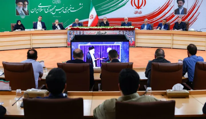 A handout photo made available by the Iranian Presidential Office shows Iran's President Masoud Pezeshkian (C-back) attending a press conference in the capital Tehran, on August 8, 2026. Oman said on August 8, that negotiations with Iran about the future administration of the Strait of Hormuz were "positive and constructive", but warned against repeated attacks on shipping as Tehran pressed its blockade of the vital waterway. (Photo by Iranian Presidential Office/AFP)/
