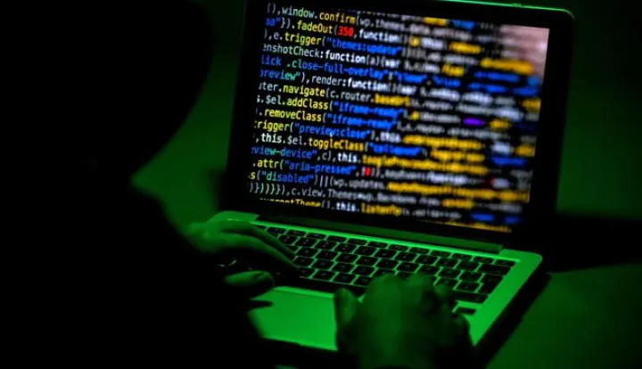 epa07261855 ILLUSTRATION - A person sits in front of a computer screen in Moers, Germany, 04 January 2019. Reports on 04 January 2019 state personal data of hundreds of German politicians, celebrities and journalists have been hacked and posted online. The compromised data reportedly includes credit card details, private chat protocols and contact information. The data was allegedly shared via a Twitter account under the name G0d (@_0rbit) prior to Christmas 2018, which has been suspended in the meantime. EPA/SASCHA STEINBACH