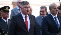 05.08.2026., Knin - Drzavni vrh krenuo je prema trgu gdje ce polaziti vijence u znak sjecanja na poginule, nestale i umrle hrvatske branitelje kod spomenika hrvatske pobjede Oluja 95 Zoran Milanović i Orsat Miljenić Photo: Igor Soban/PIXSELL