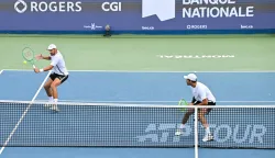 MONTREAL, CANADA - AUGUST 10: Marcelo Arevalo of El Salvador and Mate Pavic of Croatia compete against Duncan Chan and Alexis Galarneau of Canada during their doubles Quarterfinals match on day nine of the ATP 1000 National Bank Open presented by Rogers at Stade IGA on August 10, 2026 in Montreal, Quebec, Canada. Minas Panagiotakis/Getty Images/AFP (Photo by Minas Panagiotakis/GETTY IMAGES NORTH AMERICA/Getty Images via AFP)