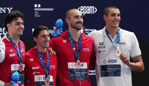 Members of team Croatia pose with their bronze medal on the podium of the men's 4x100m freestyle relay swimming event during the LEN European Aquatics Championships at the Olympic Aquatic Centre in Saint-Denis, northern suburbs of Paris, on August 13, 2026. (Photo by Dimitar DILKOFF/AFP)