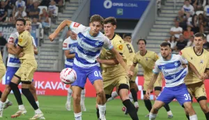 Osijek, 15. 08. 2026, Opus Arena, nogomet, SuperSport Hrvatska nogomenta liga 2026/27. Osijek - Lokomotiva. Jona Ježić ML (48) i Domagoj Bukvić ML (39)snmimio GOJKO MITIĆ