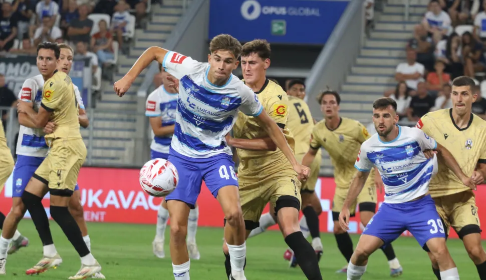 Osijek, 15. 08. 2026, Opus Arena, nogomet, SuperSport Hrvatska nogomenta liga 2026/27. Osijek - Lokomotiva. Jona Ježić ML (48) i Domagoj Bukvić ML (39)snmimio GOJKO MITIĆ