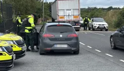 Police Service of Northern Ireland (PSNI) officers conduct a checkpoint on Concession Road in Cullaville, Co. Armagh, on Tuesday, amid a "day of action" on the roads following a significant spike in the number of road deaths in the region this year. Multiple police checkpoints took place on roads in the south of Northern Ireland on Tuesday, with the focus on a road safety message. Picture date: Tuesday July 28, 2026. Photo: Rebecca Black/PRESS ASSOCIATION