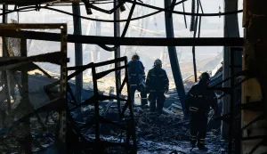 Firefighters work at a burnt-out hypermarket following an overnight Ukrainian drone strike, in the course of the Russia-Ukraine conflict in Donetsk, a Russian-controlled city of Ukraine, August 16, 2026. REUTERS/Alexander Ermochenko Photo: Alexander Ermochenko/REUTERS