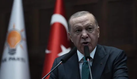 Turkish President and the leader of the Justice and Development Party (AKP) Recep Tayyip Erdogan gives a speech during his party's parliamentary group meeting at the Turkish Grand National Assembly in Ankara on February 11, 2025. (Photo by Adem ALTAN/AFP)