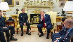 US President Donald Trump meets with lifeguard Ryder Williams in the Oval Office of the White House in Washington, DC, on August 17, 2026. The 16-year-old Williams rescued 10-year-old Nathaniel Rai in rough surf at Seabright Beach last month in Santa Cruz, California. (Photo by Jim WATSON/AFP)