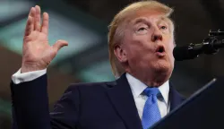GARDEN CITY, NEW YORK - AUGUST 14: U.S. President Donald Trump delivers remarks at the David S. Mack Center for Training and Intelligence on August 14, 2026 in Garden City, New York. President Trump visited the police academy to highlight the FBI's 2025 Crime Statistics Report and rally support for local Republican candidates ahead of the upcoming midterm elections. Samuel Corum/Getty Images/AFP (Photo by Samuel Corum/GETTY IMAGES NORTH AMERICA/Getty Images via AFP)