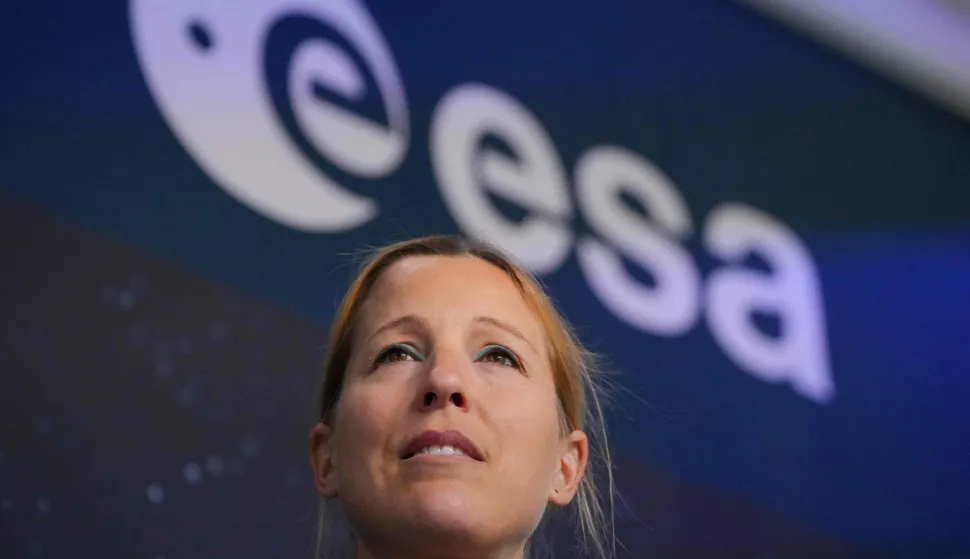 (FILES) French ESA astronaut Sophie Adenot addresses a press conference at the European Space Agency (ESA) in Cologne, western Germany on January 5, 2026. Adenot, who is currently staying on the International Space Station (ISS), will perform her first spacewalk on Tuesday, August 18, 2026, accompanied by American Anil Menon, a first for a French woman. (Photo by Pau BARRENA/AFP)