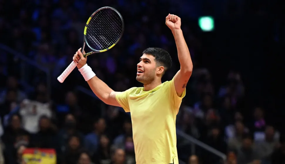 Spain's Carlos Alcaraz celebrates his victory against Italy's Jannik Sinner after their exhibition tennis match at Inspire Arena in Incheon on January 10, 2026. (Photo by Jung Yeon-je/AFP)