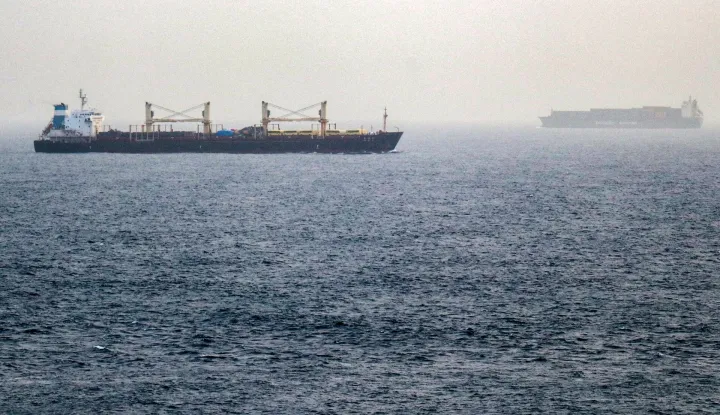 Vessels transit the Bab el-Mandeb Strait off the coast of southern Yemen on July 25, 2026. A spokesman for Yemen's Houthis had said on July 24 that the rebels were not blocking traffic through the strategic Bab al-Mandeb Strait, after they declared a maritime embargo this week on their foe Saudi Arabia. The Iran-backed group attacked a Saudi ship in the nearby Red Sea after announcing the blockade, which threatens the top oil exporter's ability to get its supplies to the world following Iran's parallel blockade of the Strait of Hormuz, the kingdom's only other maritime route. (Photo by Khaled ZIAD/AFP)/