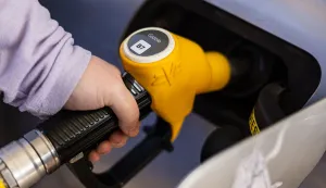 (FILES) A man fills up his car with gazole at an Esso petrol station in Rely, northern France on March 5, 2026. Diesel prices have fallen back below ?2 per litre in France, France's Ministry of the Economy announced on June 15, 2026. (Photo by Sameer Al-DOUMY/AFP)