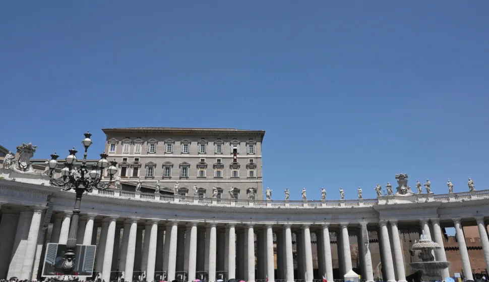 Pope Leo XIV addresses the crowd from a window of the apostolic palace overlooking St. Peter's Square during the Angelus prayer in The Vatican on May 31, 2026. (Photo by TIZIANA FABI/AFP)