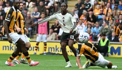 Manchester United's Danish defender #13 Patrick Dorgu (C) shoots wide during the English Premier League football match between Hull City and Manchester United at the MKM Stadium in Kingston upon Hull, eastern England on August 22, 2026. (Photo by Paul ELLIS/AFP)/RESTRICTED TO EDITORIAL USE. No use with unauthorized audio, video, data, fixture lists, club/league logos or 'live' services. Online in-match use limited to 120 images. An additional 40 images may be used in extra time. No video emulation. Social media in-match use limited to 120 images. An additional 40 images may be used in extra time. No use in betting publications, games or single club/league/player publications./