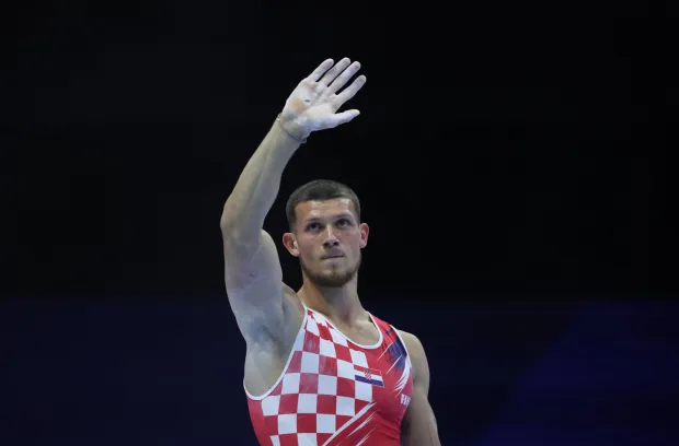 Zagreb, 22.08.2026. - Drugi dan finala po spravama na Europskom prvenstvu za gimnastičare u Zagrebu, preskok, ruče i preča. Na fotografiji Illia Kovtun osvojio zlato u ručama. foto HINA/ Damir SENČAR/ tm