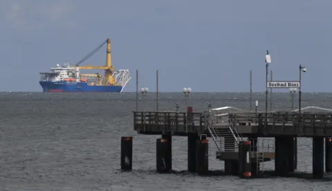 12 May 2020, Sassnitz: The Russian pipe-laying ship "Akademik Tscherski" lies in front of the chalk cliffs of the island of Ruegen. Barely five months after the construction stop on the Nord Stream 2 Baltic Sea pipeline, the Russian pipe-laying ship has reached the Baltic Sea off the island of Ruegen. Photo: Stefan Sauer/dpa-Zentralbild/dpa